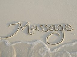 The word massage in sand